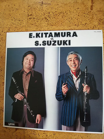 E.Kitamura Vs. S.Suzuki