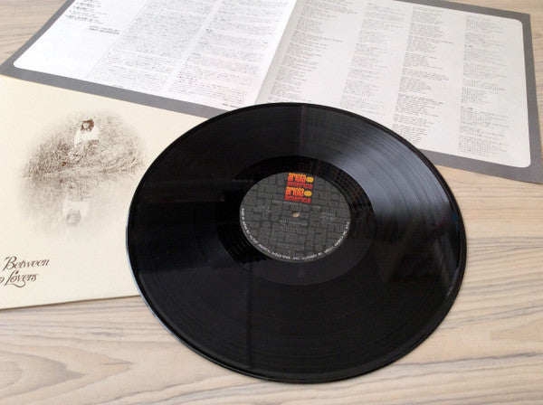 Torn Between Two Lovers