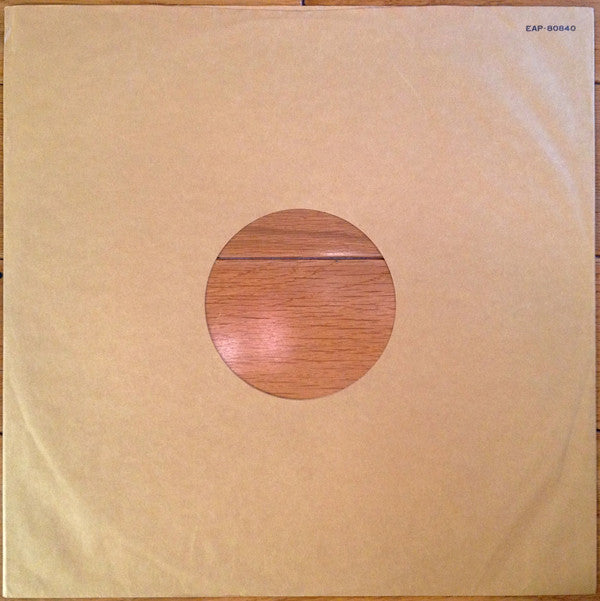 Living In The Material World