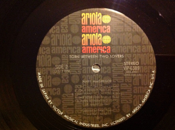 Torn Between Two Lovers