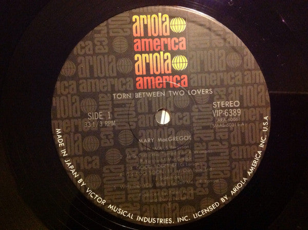 Torn Between Two Lovers