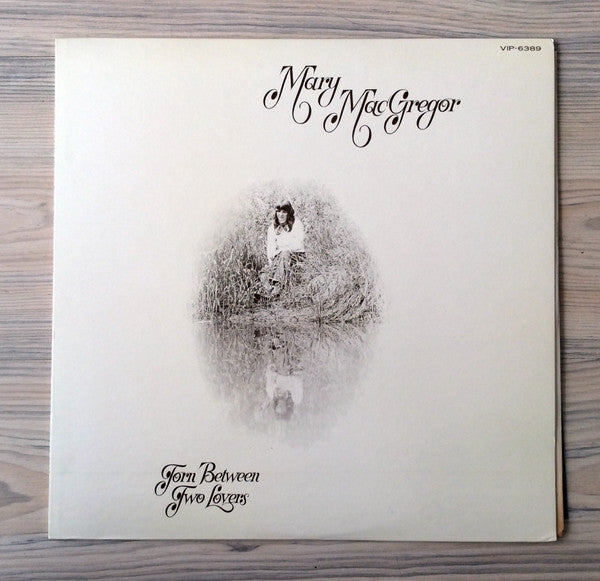 Torn Between Two Lovers