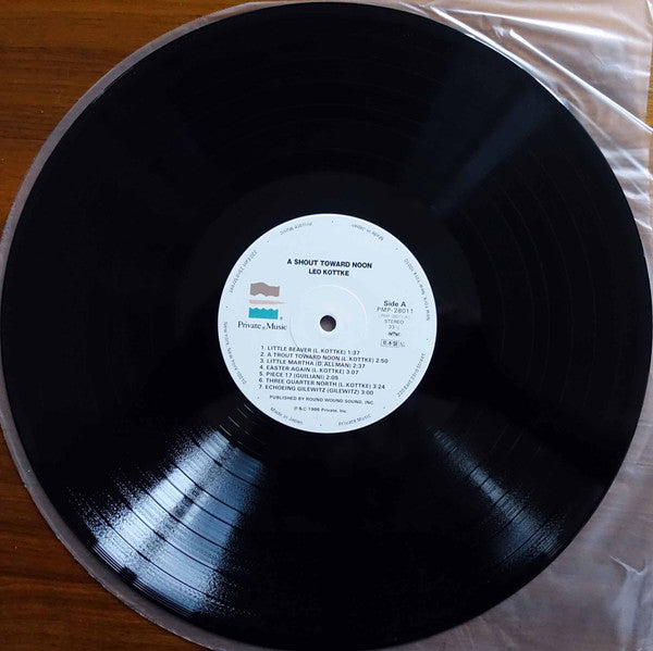 A Shout Toward Noon = 月に吠える