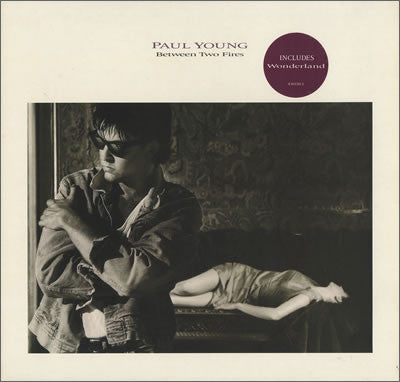 Release: Between Two Fires-Vinyl-UK-1986-450150 1, CBS 450150 1-459054