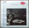 Paul Young - Between Two Fires (LP, Album) - Very Good Plus (VG+) / Very Good Plus (VG+)