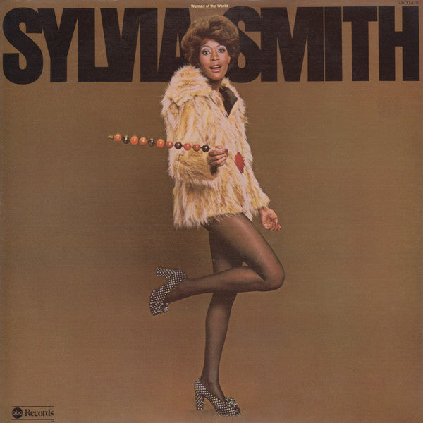 Master Release: Woman Of The World by Sylvia Smith
