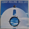 Sonny Rollins - Reel Life (Vinyl, LP, Album) Very Good Plus (VG+) / Good Plus (G+)