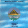 Premiata Forneria Marconi - The World Became The World (LP, Album) - Near Mint (NM or M-) / Very Good (VG)