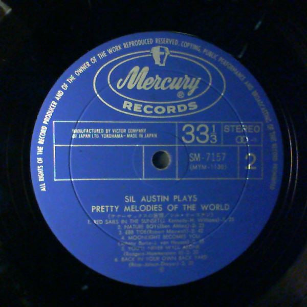 Austin Sil Plays Pretty Melodies Of The World