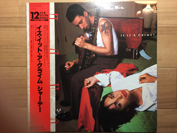 Release: Is It A Crime?-Vinyl-Japan-1985-12・3P-714-9288112