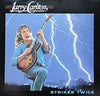 Larry Carlton - Strikes Twice = ストライクス・トワイス (LP, Album) - Very Good Plus (VG+) / Very Good Plus (VG+)