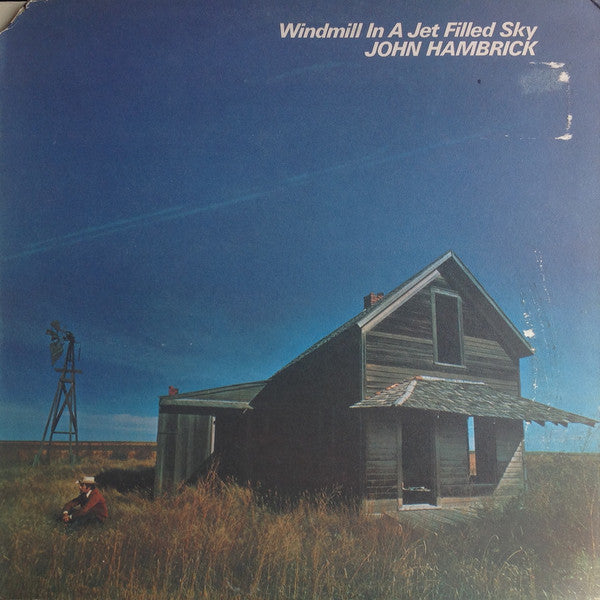 Master Release: Windmill In A Jet Filled Sky by John Hambrick