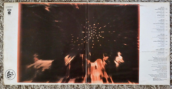 Release: Caught In The Act-Vinyl-Spain-1975-1J 164-81985/6, SABB 1-11445-6543809