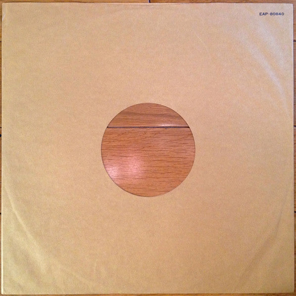 Living In The Material World