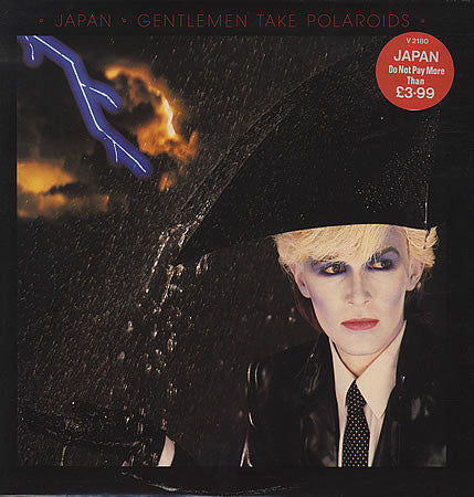 Gentlemen Take Polaroids