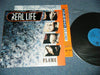 Real Life - Flame (LP, Album) - Very Good Plus (VG+) / Very Good (VG)