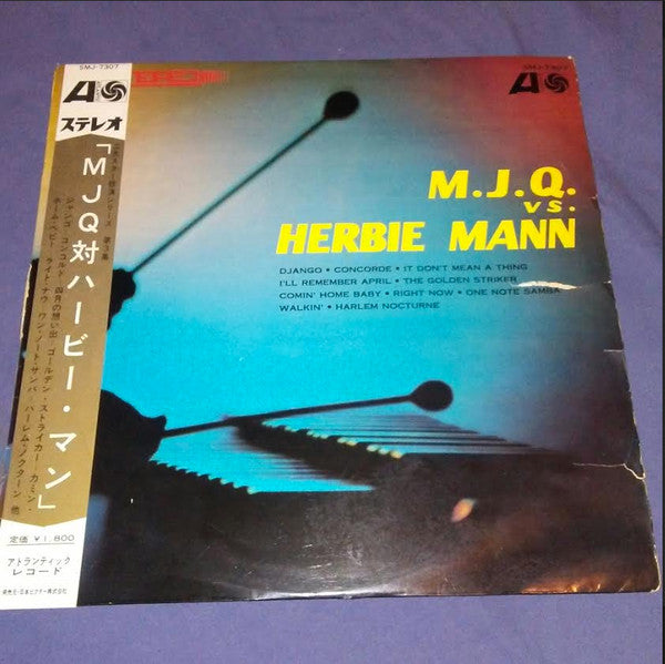 Master Release: M.J.Q. Vs. Herbie Mann  by The Modern Jazz Quartet