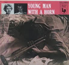 Young Man With A Horn