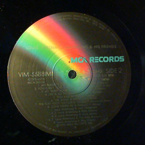 Louis "Satchmo" Armstrong And His Friends