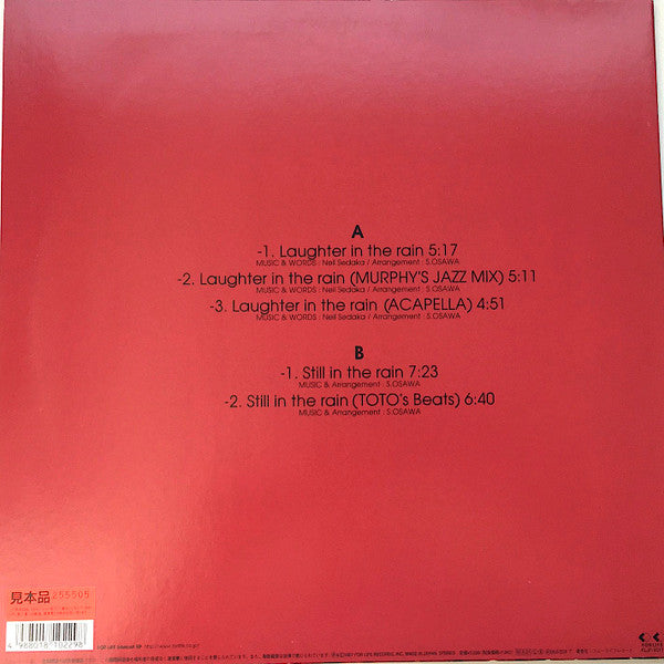 Master Release: Laughter In The Rain by Mondo Grosso