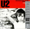 U2 - Two Hearts Beat As One (12