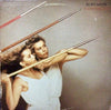 Roxy Music - Flesh + Blood (LP, Album, Stereo) - Very Good Plus (VG+) / Good Plus (G+)